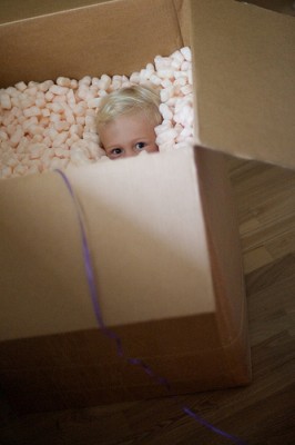 preschooler in box